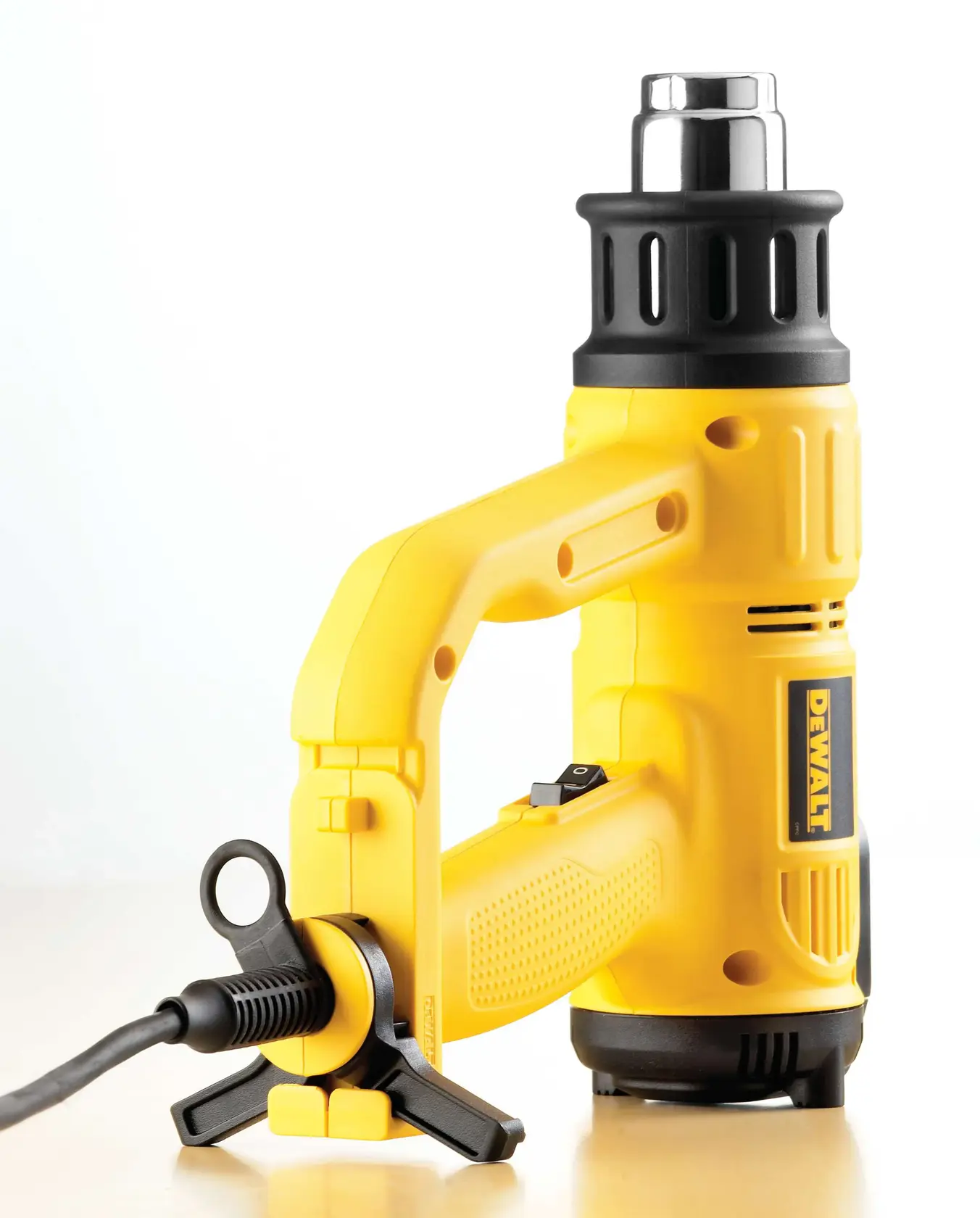 Foto soprador térmico DEWALT amarelo/preto, SKUs D26414-BR D26414 D26414-B2 D26414-GB D26414-B3, lateral.