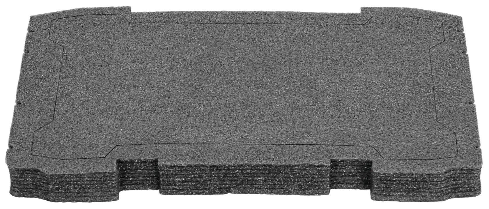 Uma pilha de insertos de espuma cinza projetados para caber em uma caixa de ferramentas DEWALT para organizar e proteger ferramentas.